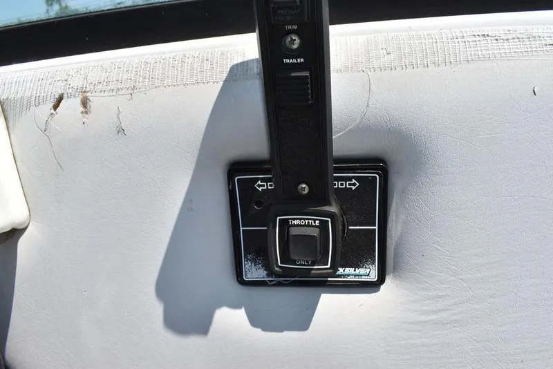 Slide: The Image of 1991 Sea Sprite 225 boat throttle control panel. - 26