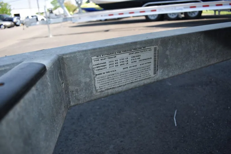 Slide: The Image of Label on a 1991 Sea Sprite 225 boat trailer, showing specifications and capacity. - 29