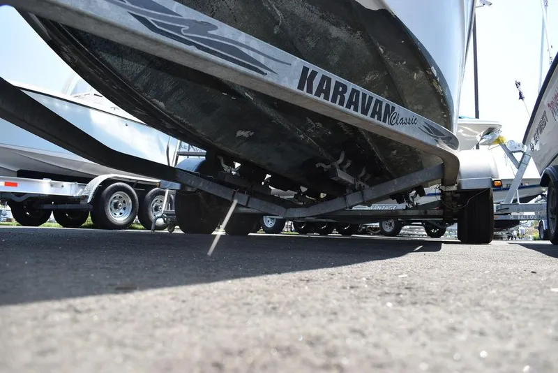 Slide: The Image of 1991 Sea Sprite 225 boat on Karavan trailer, close-up view from underneath. - 33
