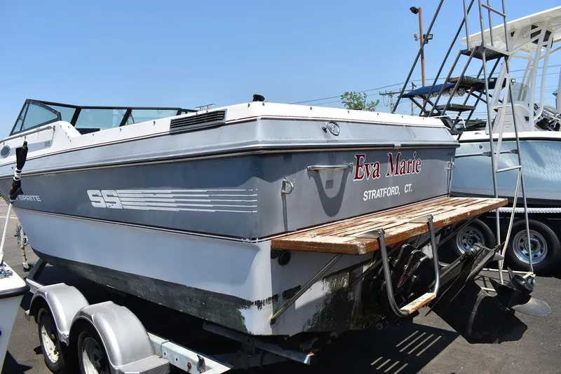 Slide: The Image of 1991 Sea Sprite 225 boat on trailer, named Eva Marie, in Stratford, CT. - 5
