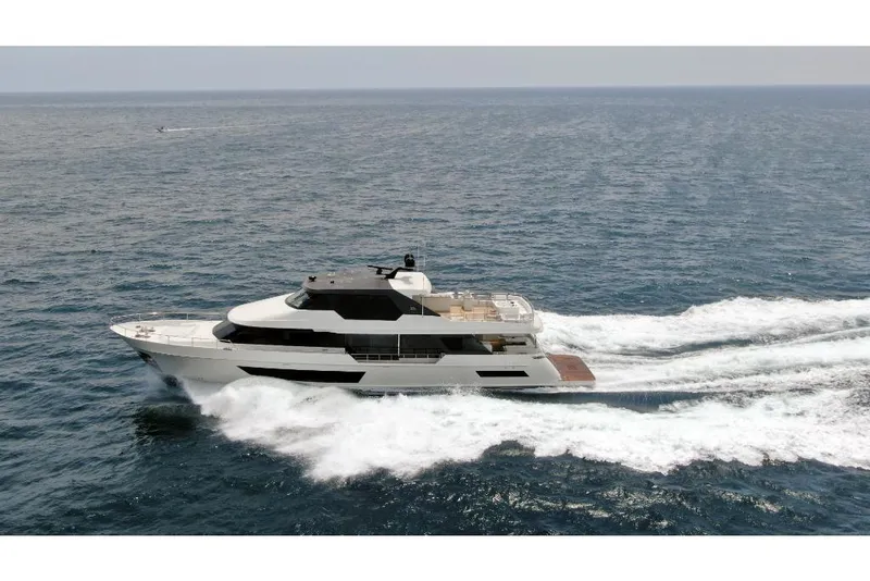 Slide: The Image of 2023 Ocean Alexander 32L yacht cruising on open water. - 0