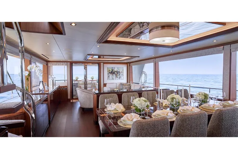 Slide: The Image of Luxurious dining area on the 2023 Ocean Alexander 32L yacht with ocean views. - 14