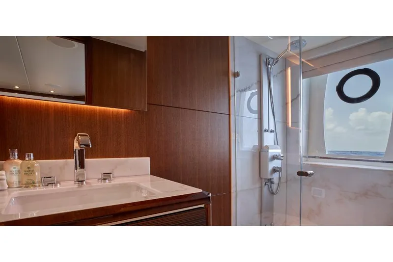 Slide: The Image of Luxury bathroom on 2023 Ocean Alexander 32L yacht with ocean view. - 29