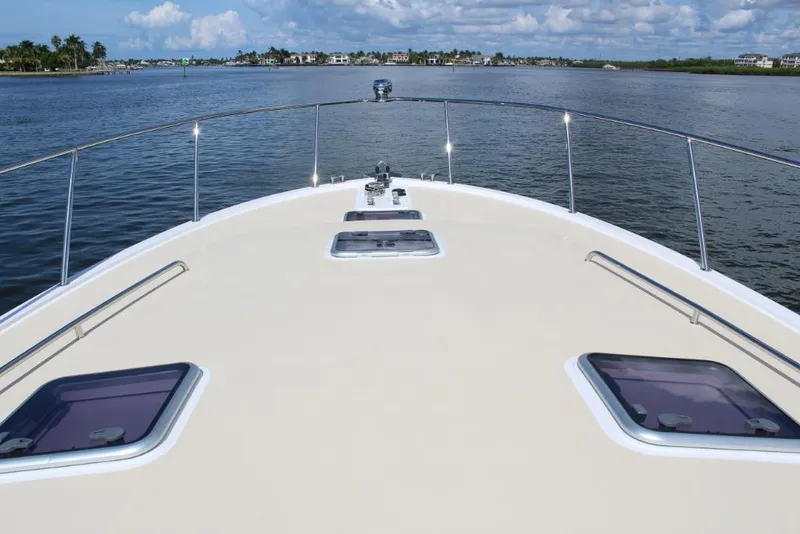 Slide: The Image of 2023 MJM 53z yacht bow view on calm water. - 4