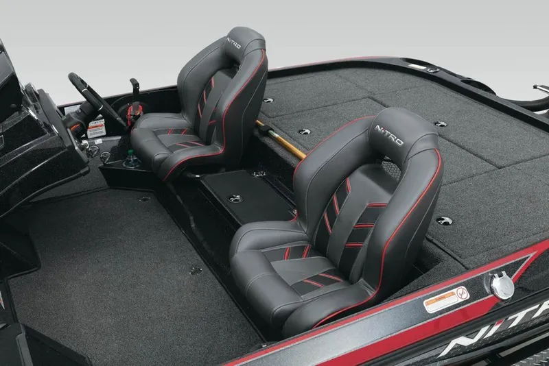 Slide: The Image of 2022 Nitro Z20 boat interior with dual black and red seats. - 10