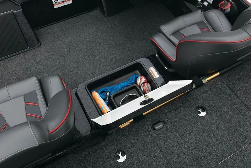 Slide: The Image of 2022 Nitro Z20 boat interior storage compartment with seats and fishing gear. - 12
