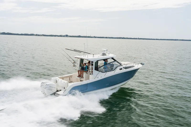 Slide: The Image of Boston Whaler 325 Conquest 2027 - 2