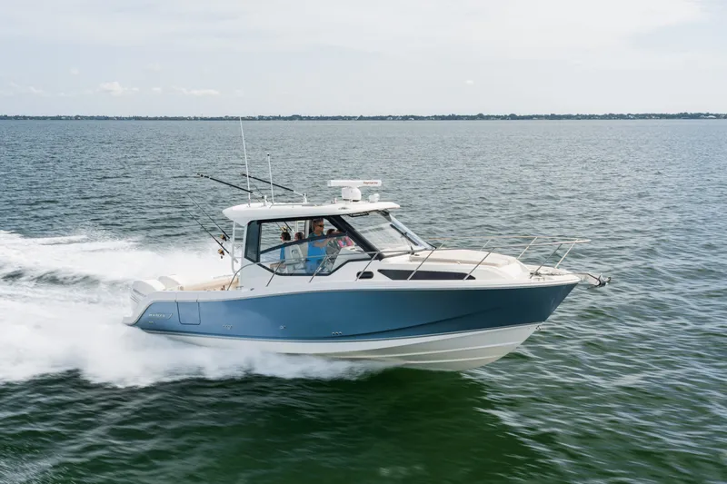 Slide: The Image of Boston Whaler 325 Conquest 2027 - 1