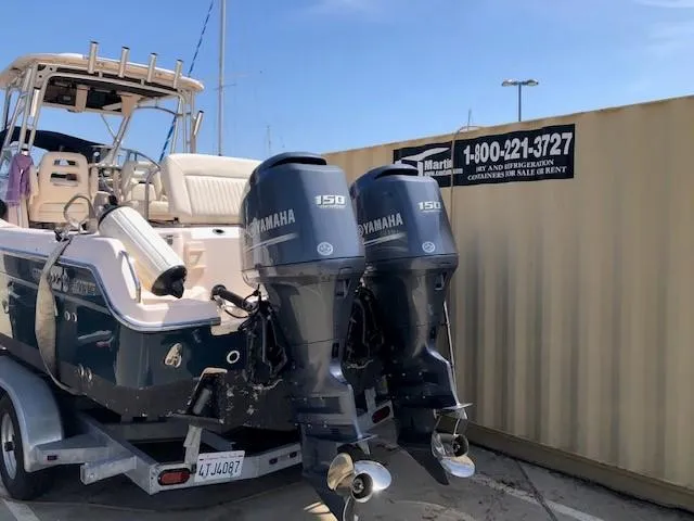 Slide: The Image of 2014 Grady-White Journey 258 boat with twin Yamaha 150 engines on a trailer. - 5
