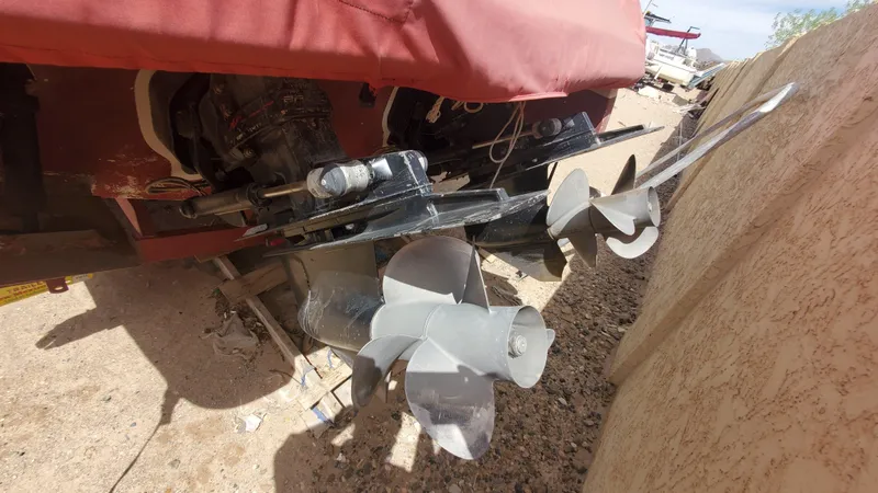 Slide: The Image of 1997 Chaparral Signature 29 boat propellers and stern drive close-up. - 18