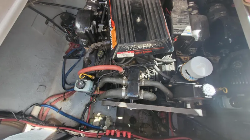 Slide: The Image of 1997 Chaparral Signature 29 engine compartment with MerCruiser 5.7L V8 engine. - 20