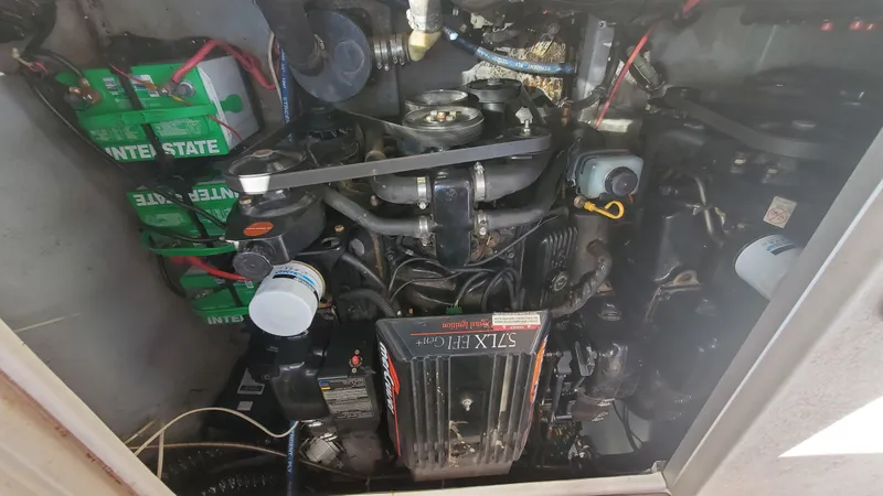 Slide: The Image of 1997 Chaparral Signature 29 engine compartment with Interstate batteries. - 21