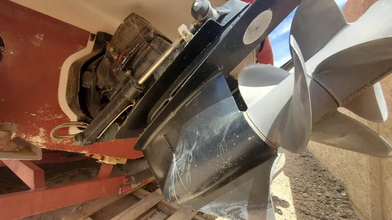 Slide: The Image of Close-up of 1997 Chaparral Signature 29 boat propeller and stern drive. - 28