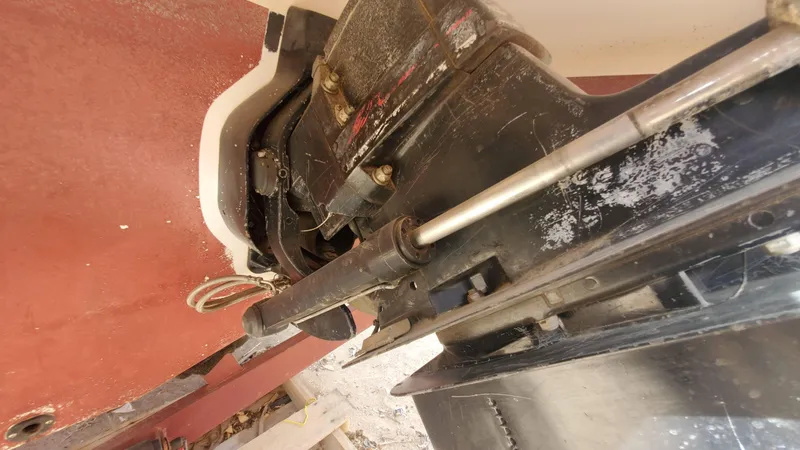 Slide: The Image of Close-up of the 1997 Chaparral Signature 29 boat's stern drive system. - 30