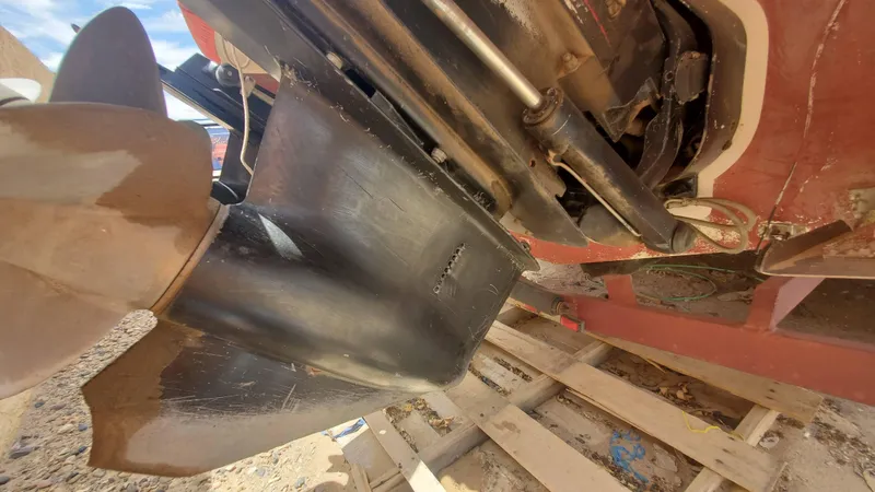 Slide: The Image of Close-up of the propeller and stern drive of a 1997 Chaparral Signature 29 boat. - 31