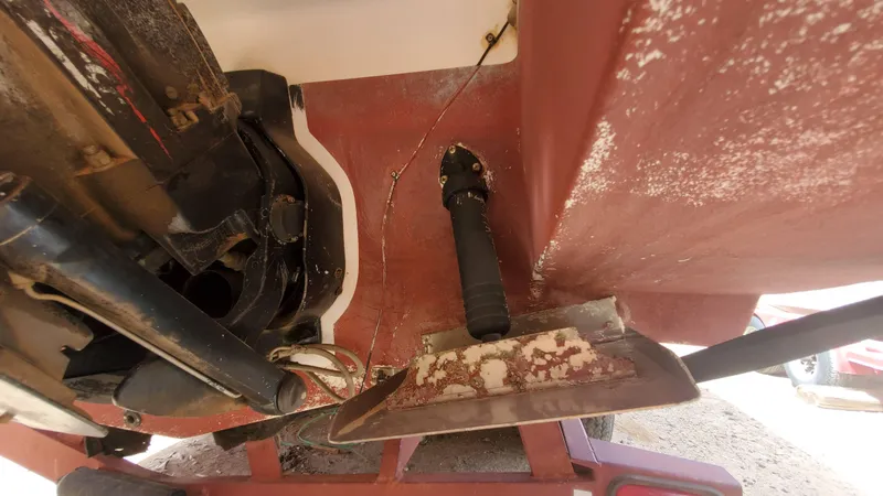 Slide: The Image of 1997 Chaparral Signature 29 boat underside showing mechanical components and wear. - 32