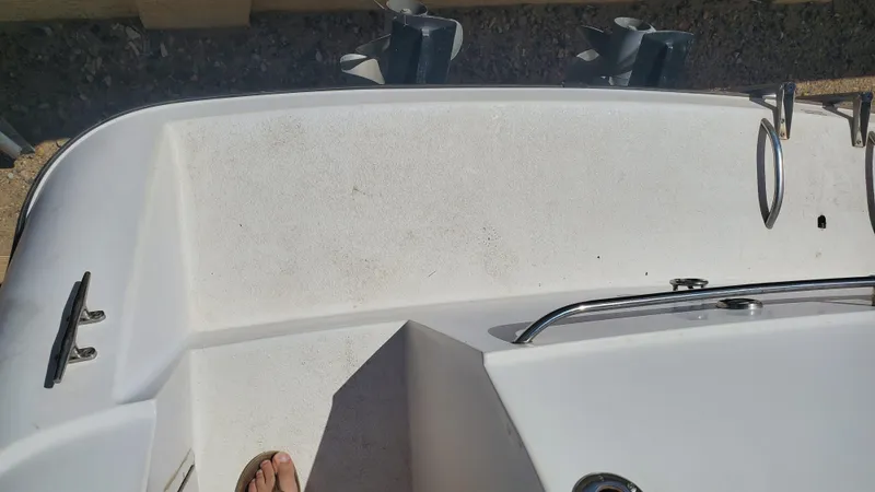 Slide: The Image of 1997 Chaparral Signature 29 boat deck with railing and cleats. - 34