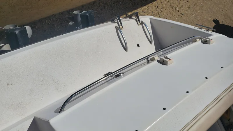 Slide: The Image of 1997 Chaparral Signature 29 boat deck with clean white surface and railing. - 35