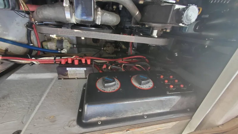 Slide: The Image of 1997 Chaparral Signature 29 engine compartment with wiring and control panel. - 43