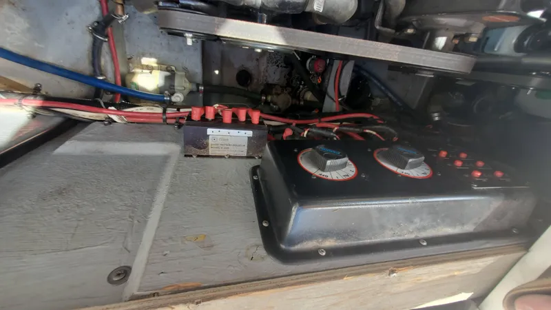 Slide: The Image of 1997 Chaparral Signature 29 engine compartment with wiring and control panel. - 44