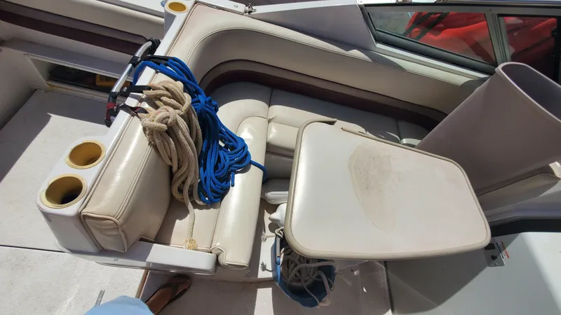 Slide: The Image of 1997 Chaparral Signature 29 boat interior with seating and ropes. - 46