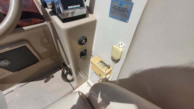 Slide: The Image of 1997 Chaparral Signature 29 boat cockpit controls and communication equipment. - 49