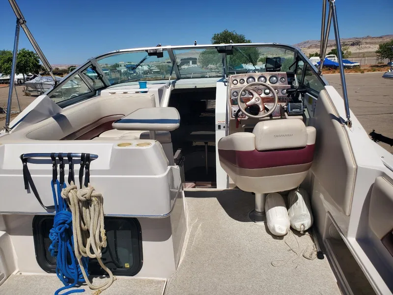 Slide: The Image of 1997 Chaparral Signature 29 boat interior with steering wheel and seating. - 6
