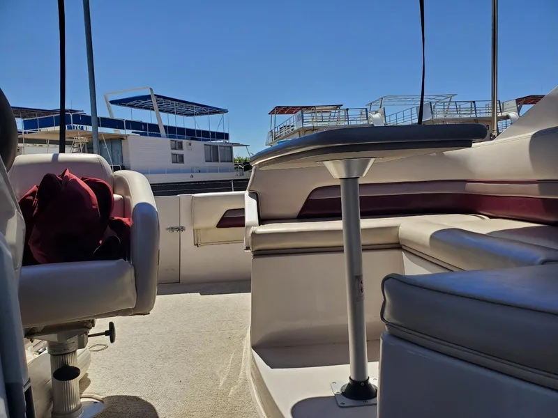 Slide: The Image of Interior of 1997 Chaparral Signature 29 boat with seating and table. - 8