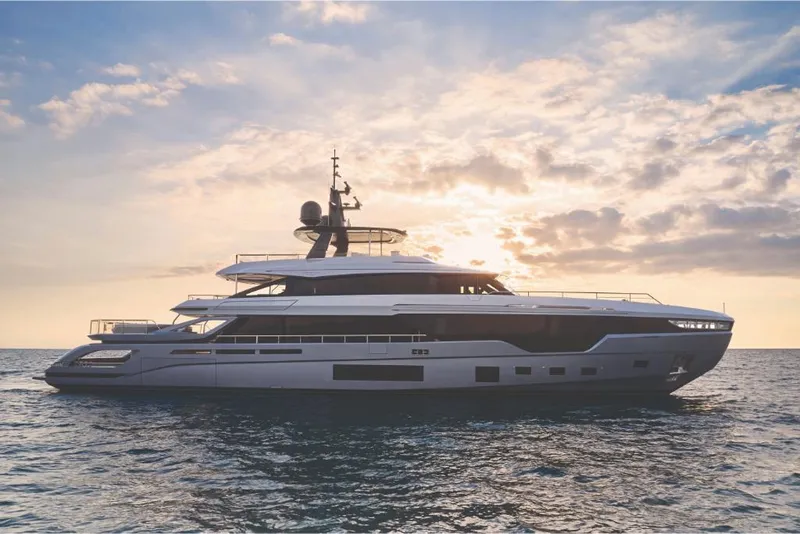 Slide: The Image of 2023 Azimut Trideck yacht cruising at sunset. - 0
