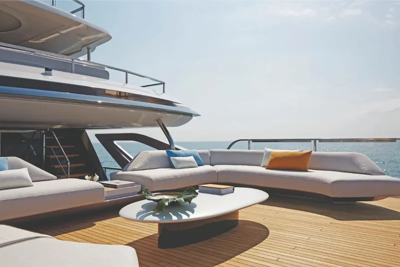 Slide: The Image of Luxurious deck of 2023 Azimut Trideck yacht with modern seating and ocean view. - 14