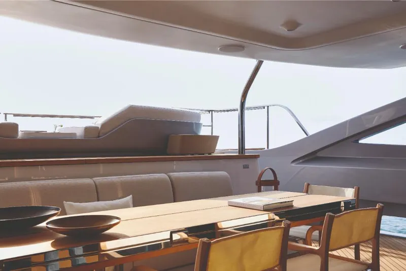 Slide: The Image of Luxurious interior of 2023 Azimut Trideck yacht with elegant dining area. - 20
