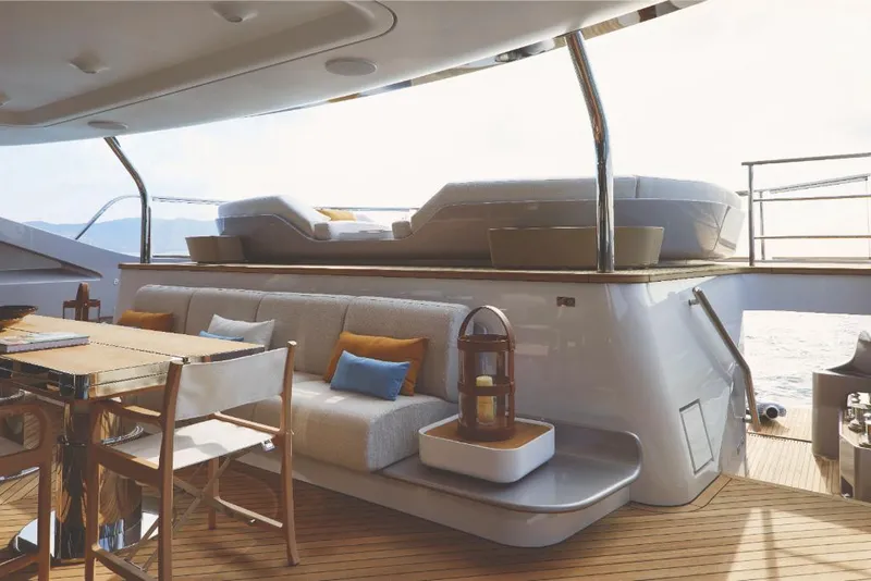 Slide: The Image of Luxury deck seating area on 2023 Azimut Trideck yacht with ocean view. - 24
