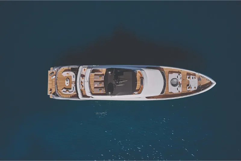 Slide: The Image of Aerial view of 2023 Azimut Trideck luxury yacht on open water. - 4