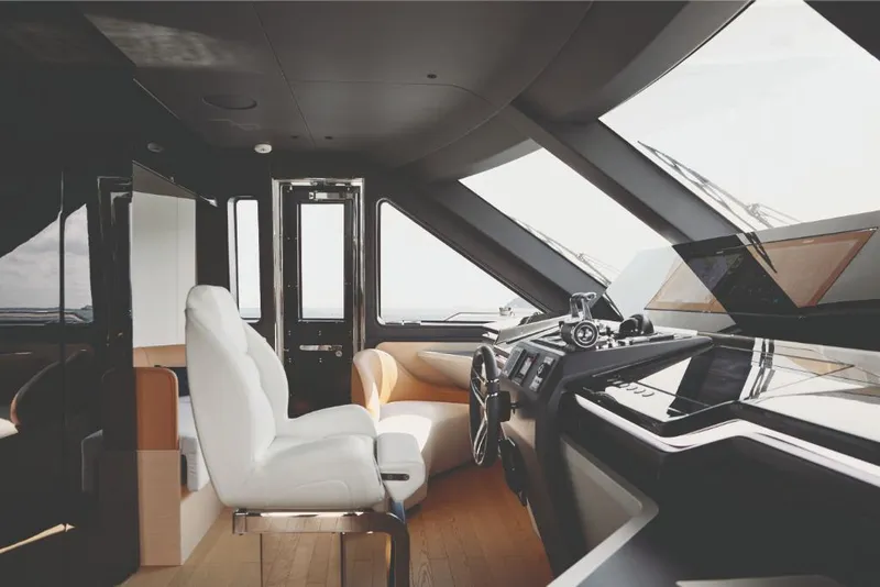 Slide: The Image of Luxurious helm station of the 2023 Azimut Trideck yacht with modern design. - 40