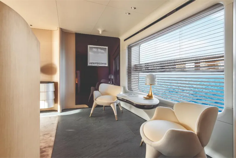 Slide: The Image of Luxurious interior of 2023 Azimut Trideck yacht with modern seating and ocean view. - 45