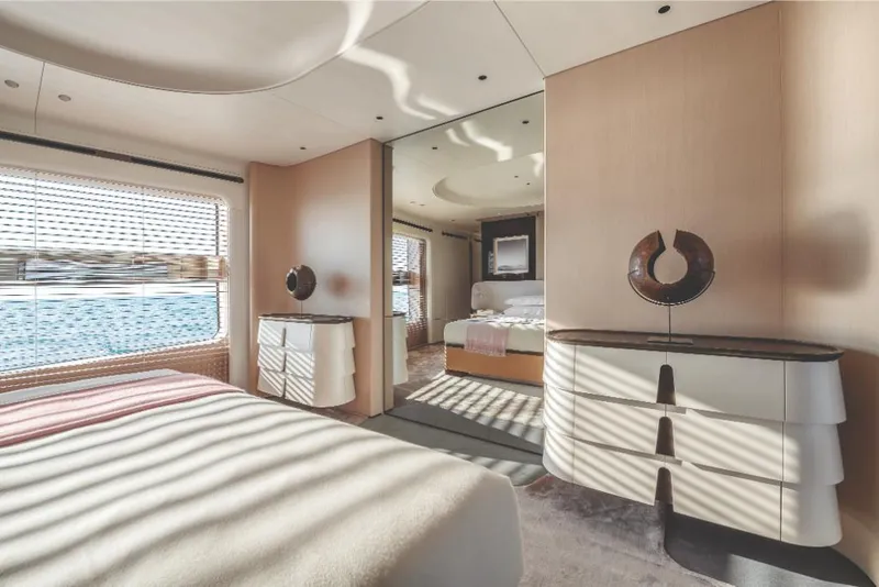 Slide: The Image of Luxurious bedroom interior of 2023 Azimut Trideck yacht with modern decor and ocean view. - 46