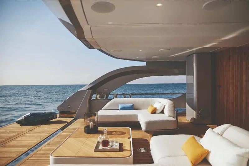 Slide: The Image of Luxurious deck of 2023 Azimut Trideck yacht with ocean view and modern seating. - 9