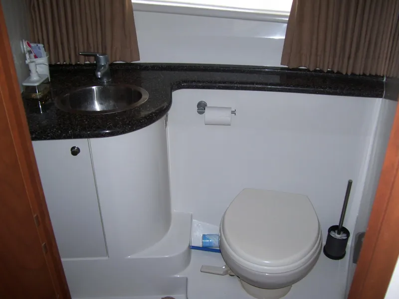 Slide: The Image of Bathroom interior of 2007 Carver 43 Motor Yacht with sink and toilet. - 22