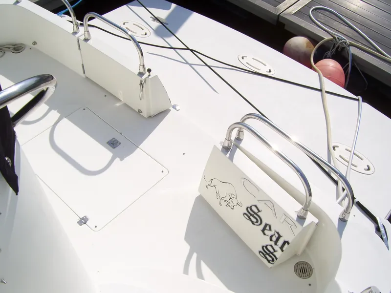 Slide: The Image of 2007 Carver 43 Motor Yacht deck with railings and dock lines. - 6