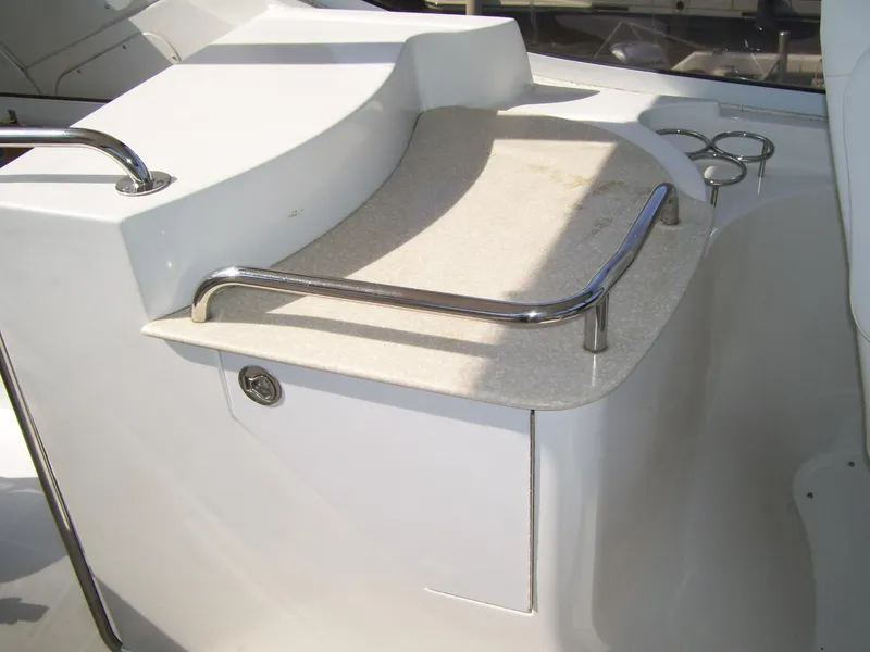 Slide: The Image of 2007 Carver 43 Motor Yacht interior detail with sleek countertop and stainless steel railings. - 14