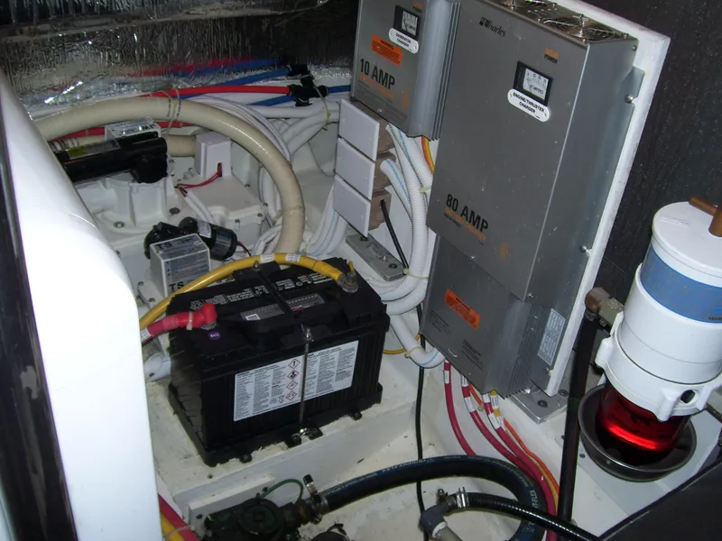Slide: The Image of Engine room of 2007 Carver 43 Motor Yacht with battery and electrical components. - 32