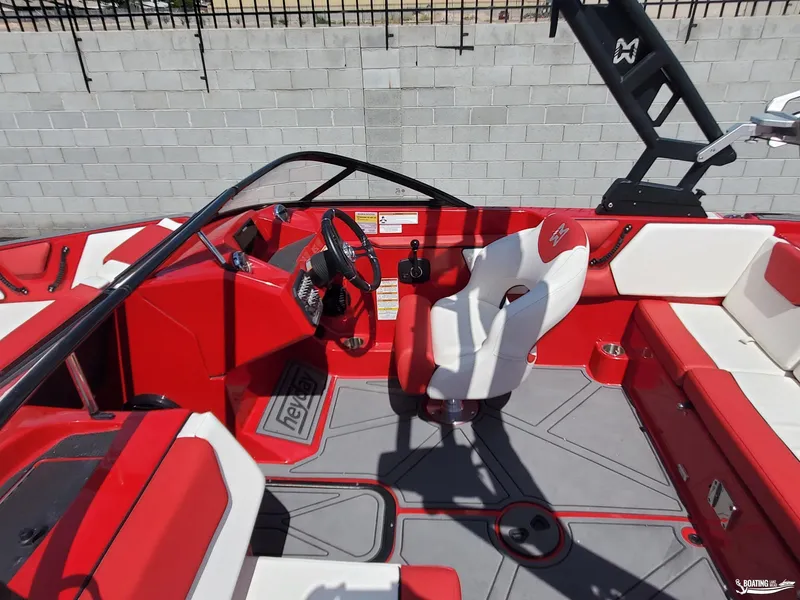 Slide: The Image of 2022 Heyday WT-2DC boat interior with red and white seating and steering wheel. - 10