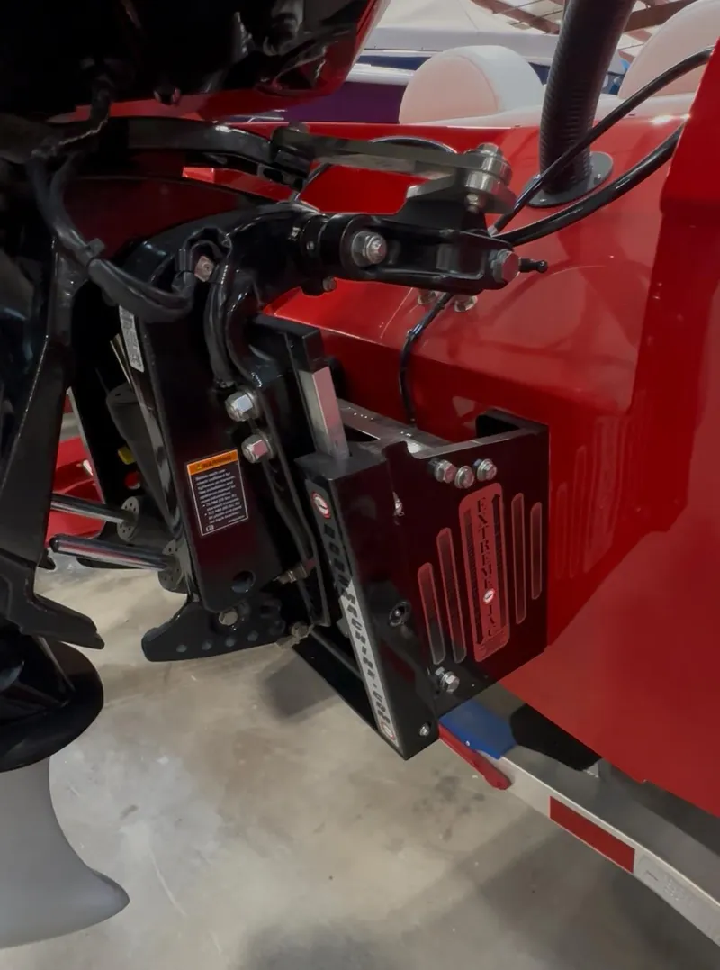 Slide: The Image of Close-up of Velocity 22 Punisher 2026 boat engine mount and components. - 12