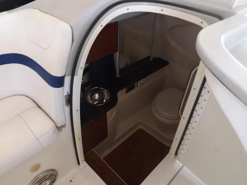 Slide: The Image of 2008 Formula 310 Bowrider interior cabin with toilet and sink. - 14