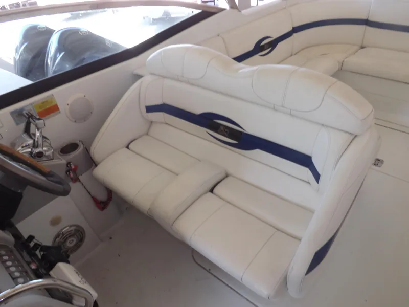 Slide: The Image of 2008 Formula 310 Bowrider interior with white and blue seating. - 16