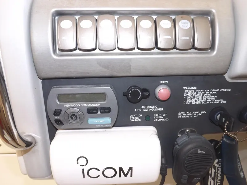 Slide: The Image of Control panel of a 2008 Formula 310 Bowrider with ICOM and Kenwood Commander. - 21