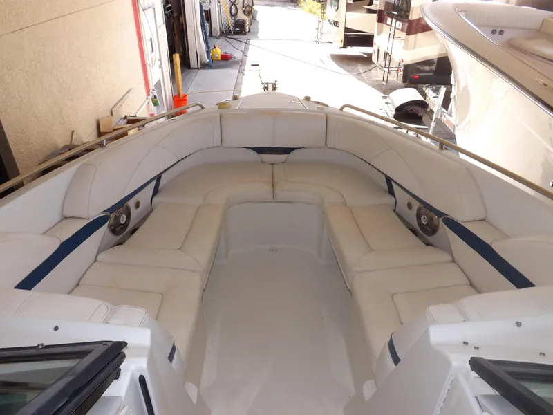 Slide: The Image of 2008 Formula 310 Bowrider with spacious white seating in the bow area. - 26