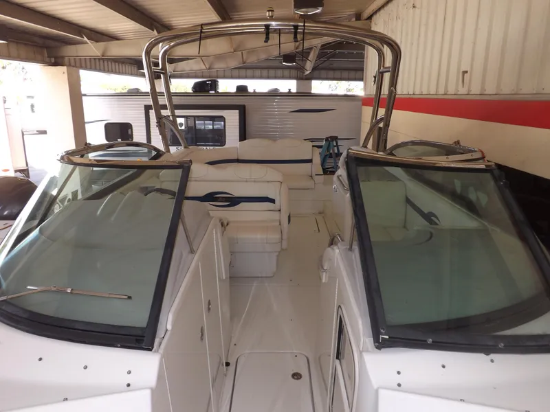 Slide: The Image of 2008 Formula 310 Bowrider boat interior with dual windshields and seating. - 27