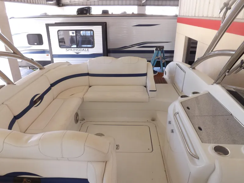 Slide: The Image of Interior of a 2008 Formula 310 Bowrider with white and blue seating. - 28