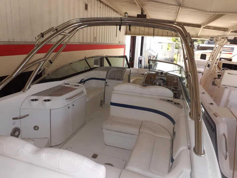 Slide: The Image of 2008 Formula 310 Bowrider boat interior with white seating and stainless steel accents. - 31